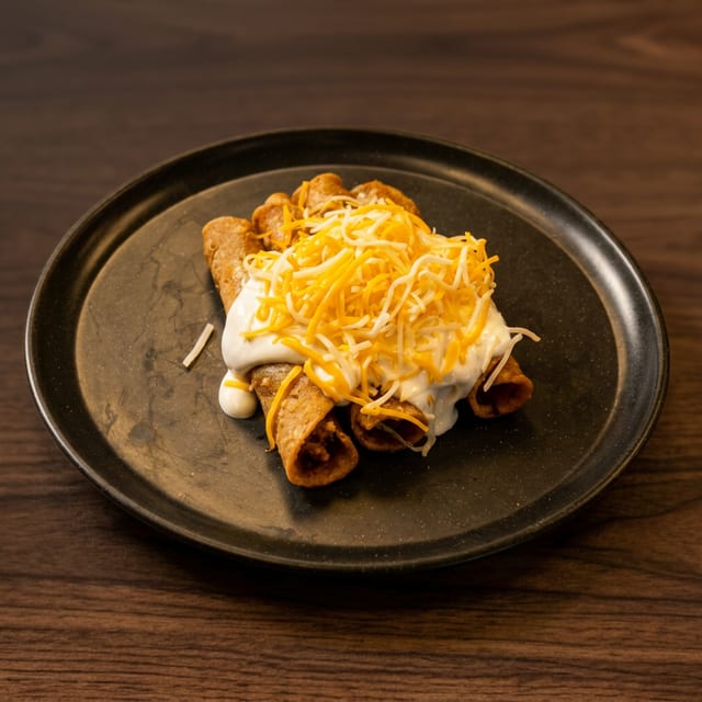 Rolled Taquitos with Cheese & Sour Cream.